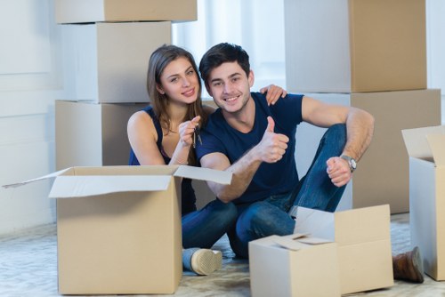 Van transport near Hammersmith with boxes and household items
