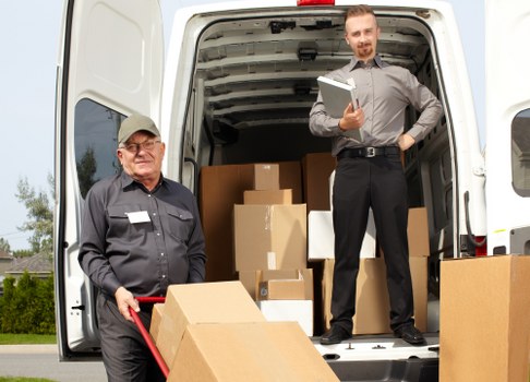 Local Hammersmith man with a van handling boxes and furniture for transport
