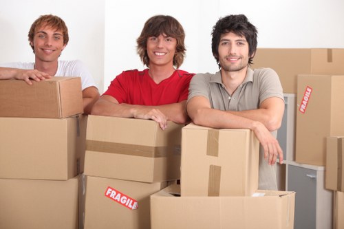 Furniture and boxes being loaded into a van in Hammersmith