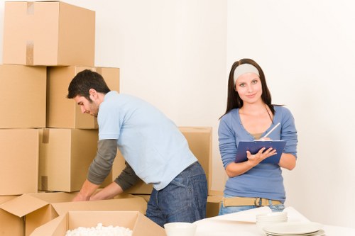 Loading furniture into a removal truck in Hammersmith