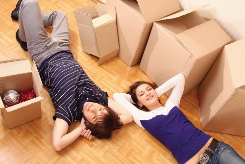 Boxes and furniture prepared for an apartment move in West London
