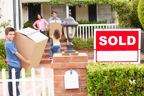 Packed boxes and furniture ready for transport during a Hammersmith house move